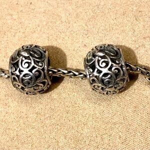 🆕Listing! Two Brighton Cathedral beads Silver with pierced scroll design Retired